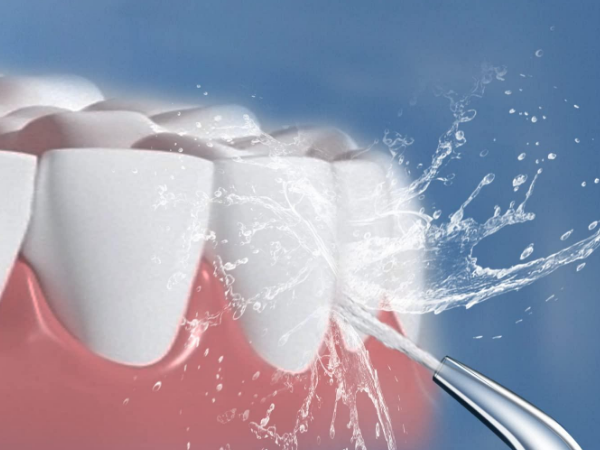 What is an oral irrigator?